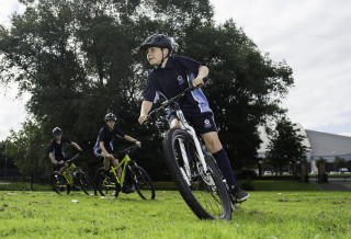 Child taking part in HSBC UK Go-Ride at school