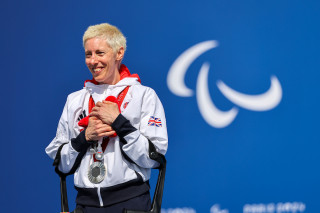 Fran Brown on the Paralympic woen's C1-3 time-trial podium