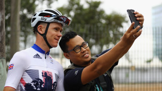 Team GB's Chris Froome poses for a photo with a fan in Rio