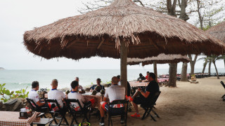 Team GB's Chris Froome, Geraint Thomas, Ian Stannard, Adam Yates and Steve Cummings stop at a cafe in Rio during an Olympic road race training ride