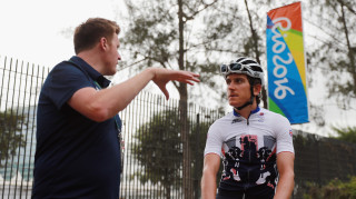 Team GB's Geraint Thomas speaks to coach Rod Ellingworth on a training ride in Rio