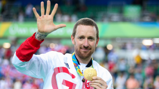 Sir Bradley Wiggins celebrates his fifth gold and eighth Olympic medal